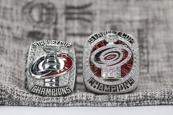 GameDayRings Carolina Hurricanes 2006 and 2026 championship fan rings displayed together