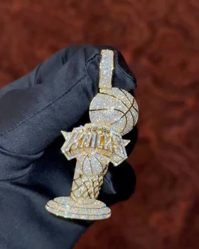 Diamond New York Knicks championship trophy pendant worn by Josh Hart and Karl-Anthony Towns